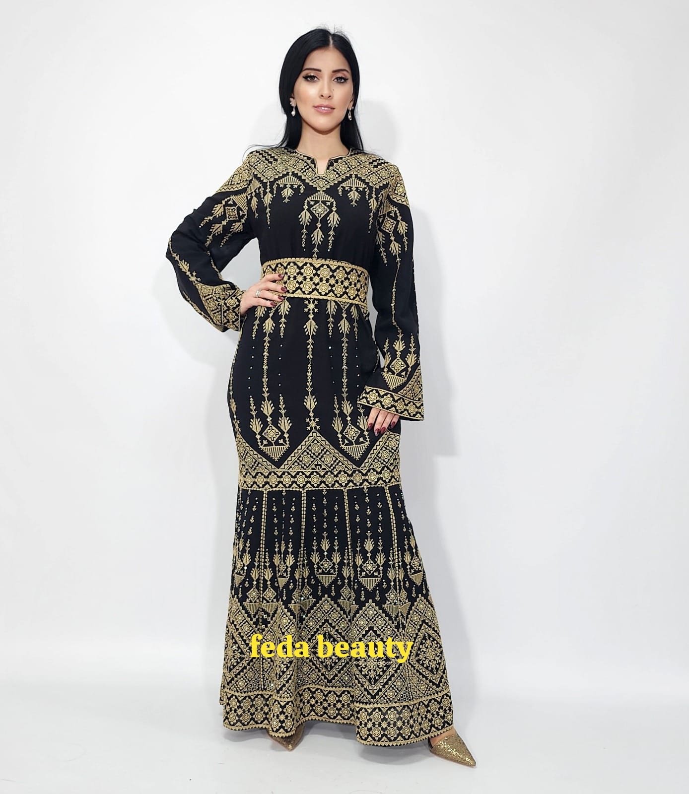 An embroidered dress from Fida Beauty's new collection for the year 2023